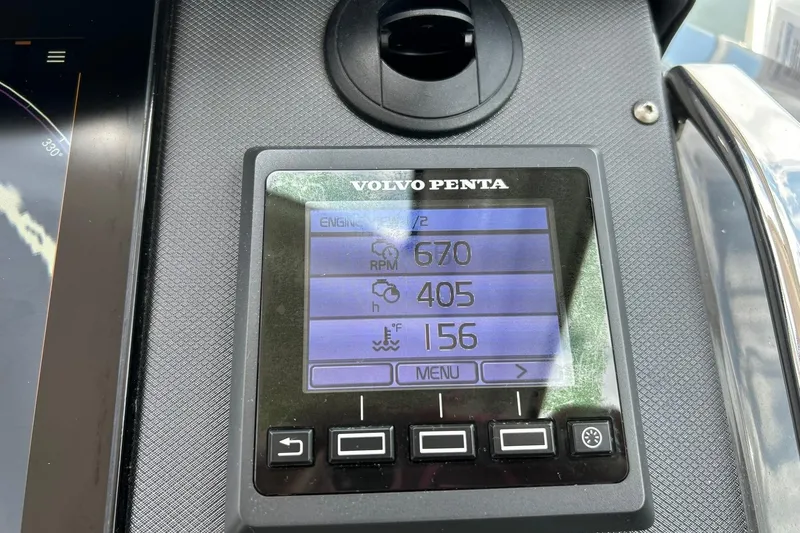 Slide: The Image of Volvo Penta engine display on 2017 Monterey 360 Sport Coupe, showing RPM and engine hours. - 50