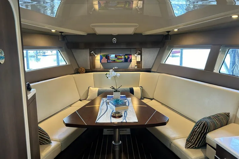 Slide: The Image of Luxurious interior of 2017 Monterey 360 Sport Coupe yacht with elegant seating and decor. - 59