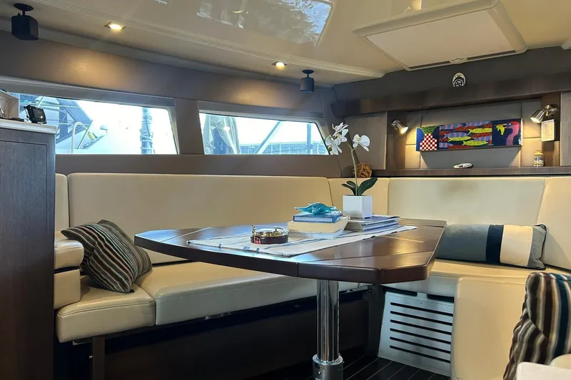 Slide: The Image of Luxurious interior of a 2017 Monterey 360 Sport Coupe yacht with elegant seating and decor. - 60