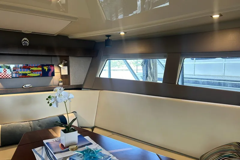 Slide: The Image of Luxurious interior of a 2017 Monterey 360 Sport Coupe yacht with elegant seating and decor. - 61