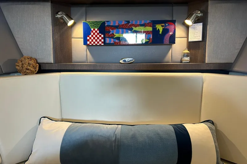 Slide: The Image of Luxurious interior of 2017 Monterey 360 Sport Coupe with modern art and ambient lighting. - 62