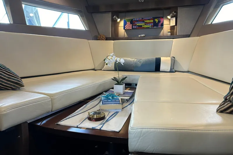 Slide: The Image of Luxurious interior of 2017 Monterey 360 Sport Coupe with cream leather seating and decor. - 64