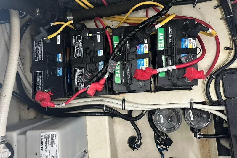 Slide: The Image of Battery compartment of a 2017 Monterey 360 Sport Coupe with wiring and connections. - 81