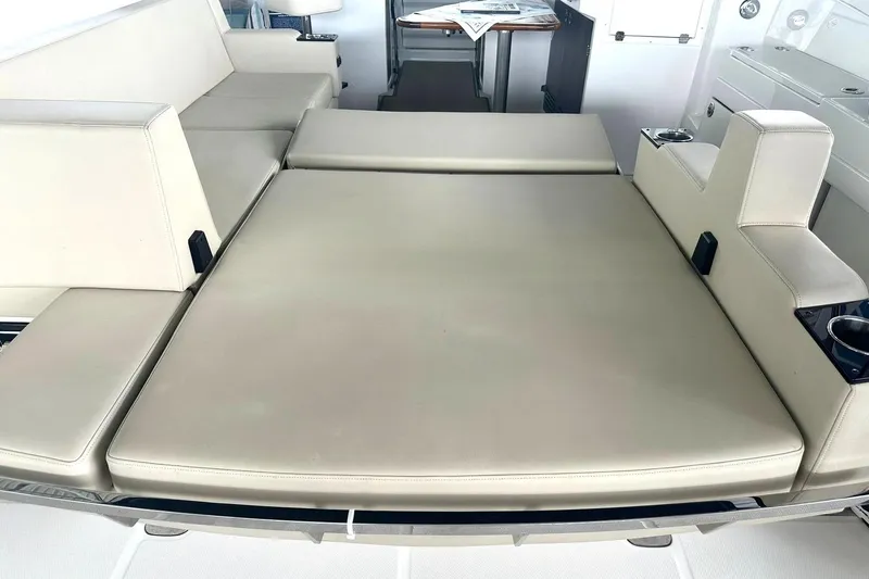 Slide: The Image of Luxurious seating area on a 2017 Monterey 360 Sport Coupe yacht. - 90