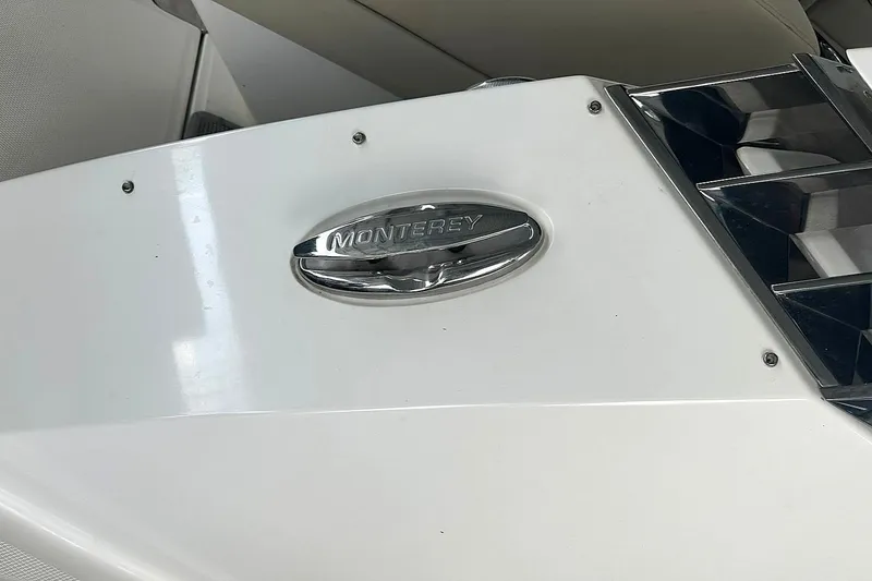 Slide: The Image of 2017 Monterey 360 Sport Coupe emblem on sleek white surface. - 94