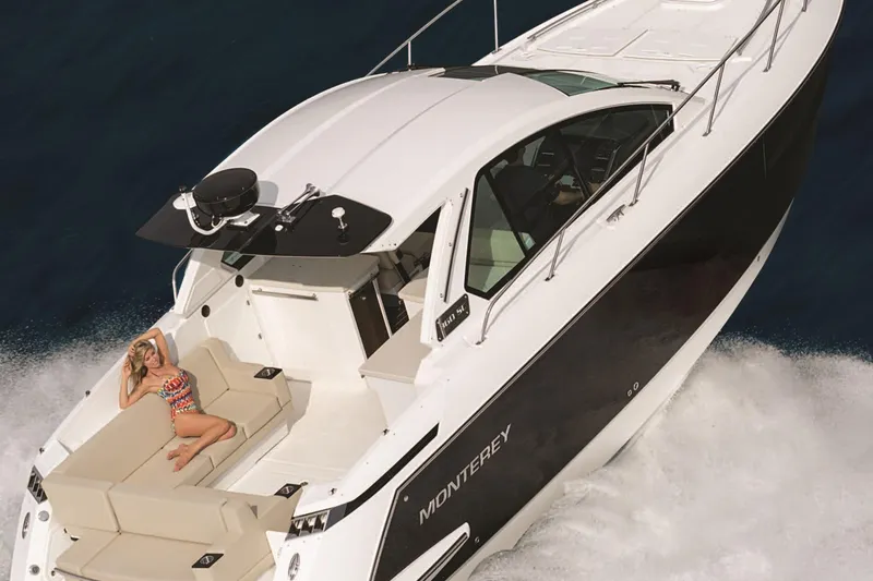 Slide: The Image of Boating magazine cover featuring 2017 Monterey 360 Sport Coupe on water. - 95