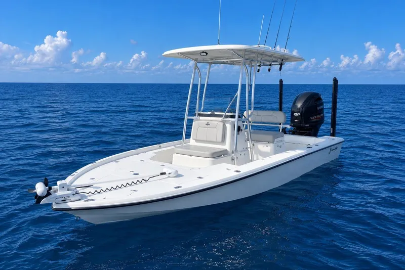 The Image of 2017 Yellowfin 21 Hybrid boat on open ocean under clear blue sky. - 0