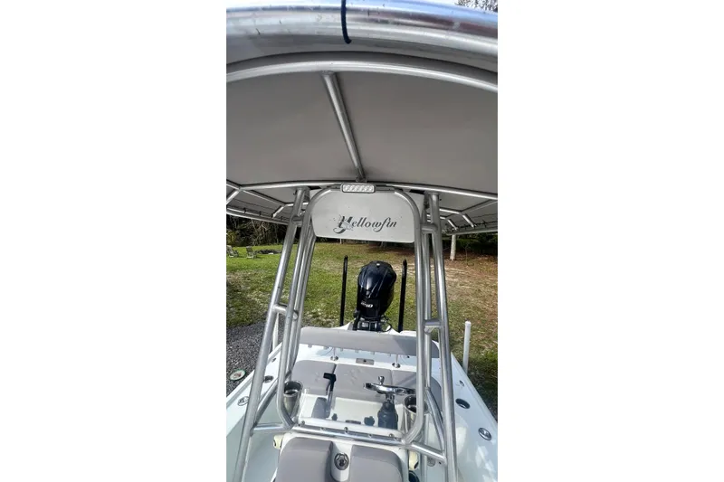Slide: The Image of 2017 Yellowfin 21 Hybrid boat with T-top and outboard motor. - 20