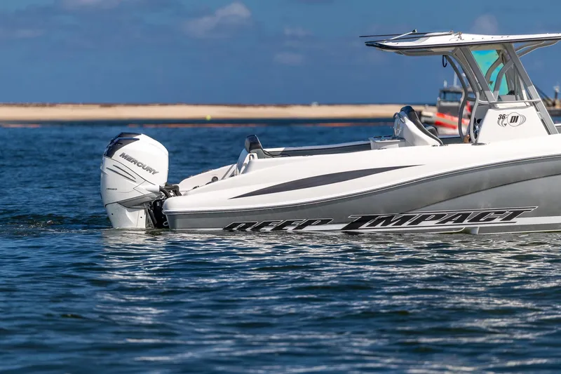 Slide: The Image of 2019 Deep Impact 369 Sport boat with Mercury engine on open water. - 13