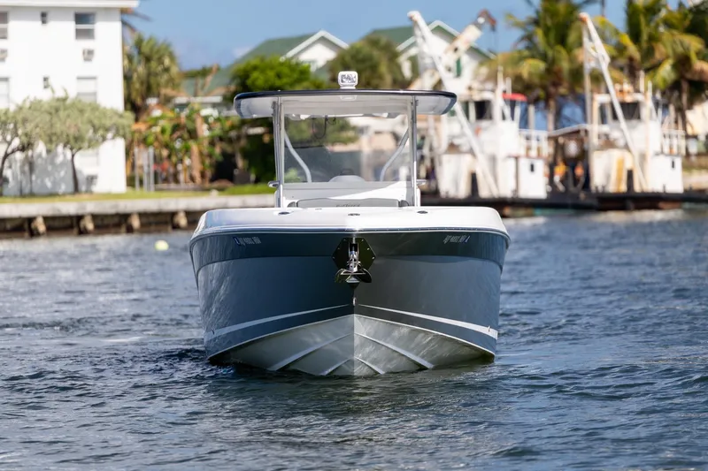 Slide: The Image of 2019 Deep Impact 369 Sport boat cruising on a sunny waterfront. - 18