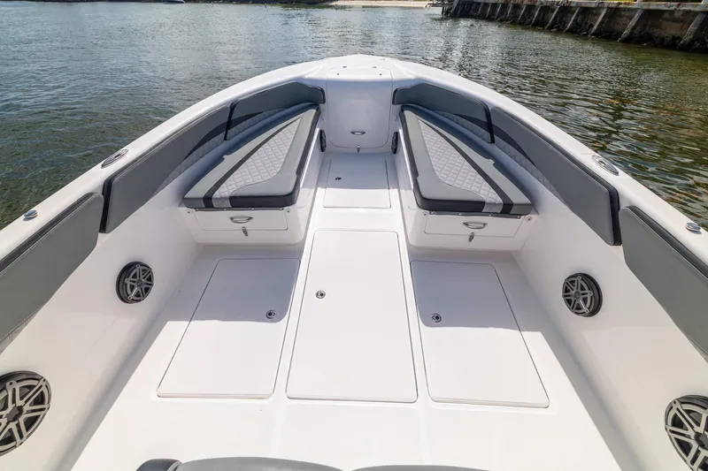 Slide: The Image of 2019 Deep Impact 369 Sport boat interior with cushioned seating and sleek design. - 29