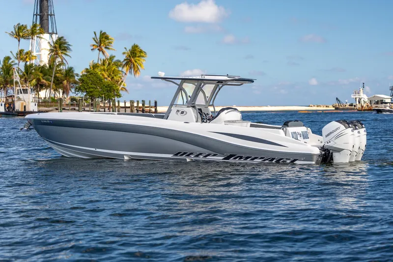 Slide: The Image of 2019 Deep Impact 369 Sport boat on water, featuring sleek design and powerful engines. - 3