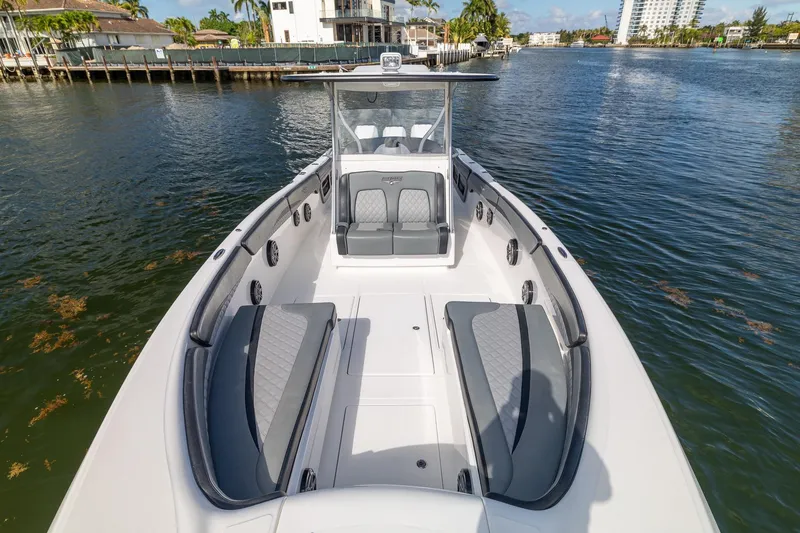 Slide: The Image of 2019 Deep Impact 369 Sport boat with sleek seating on calm water. - 31