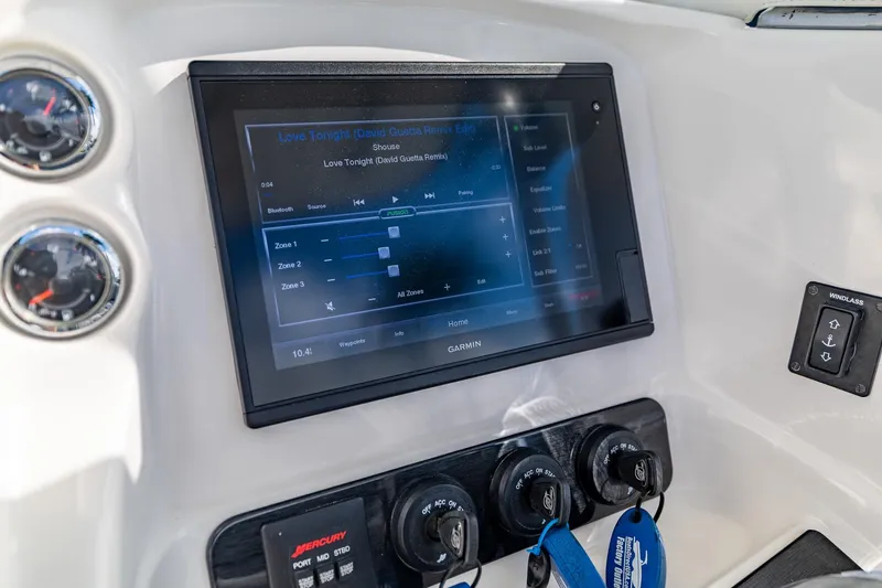 Slide: The Image of Control panel of 2019 Deep Impact 369 Sport boat with Garmin display and gauges. - 47