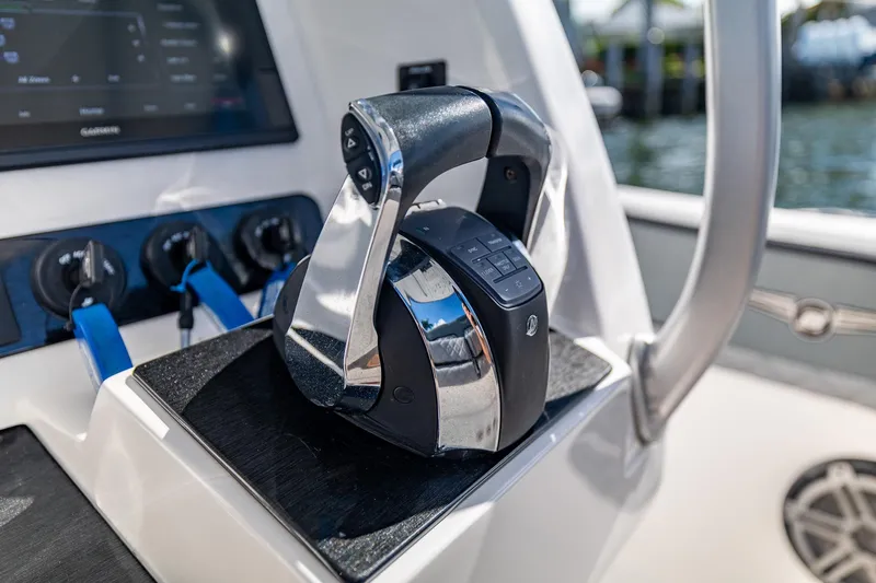 Slide: The Image of Throttle control on 2019 Deep Impact 369 Sport boat dashboard. - 51