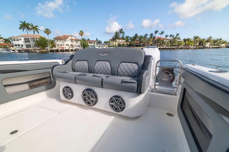 Slide: The Image of Luxury seating on 2019 Deep Impact 369 Sport boat with waterfront view. - 61