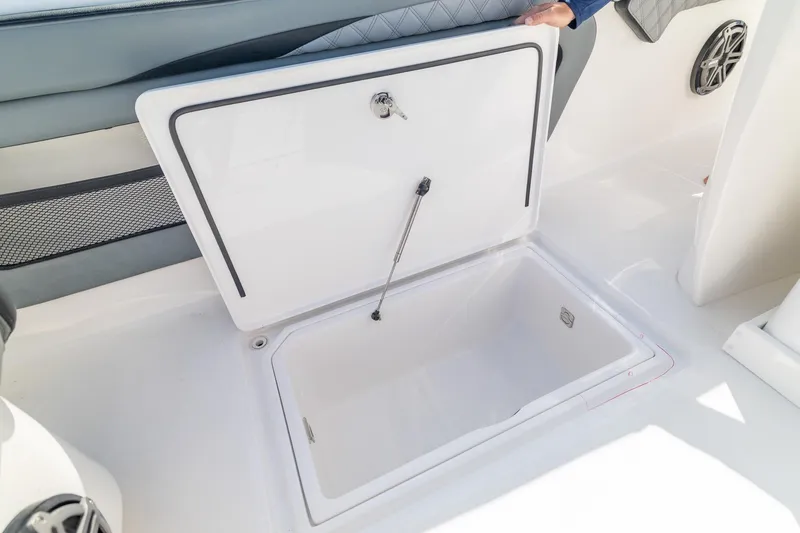 Slide: The Image of Open storage compartment on 2019 Deep Impact 369 Sport boat interior. - 64