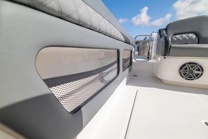 Slide: The Image of Interior view of 2019 Deep Impact 369 Sport boat, featuring sleek seating and storage. - 69