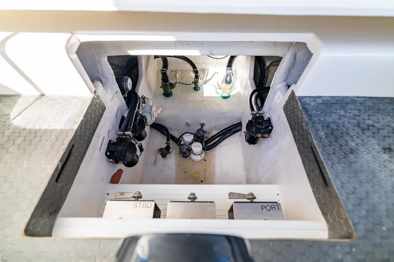 Slide: The Image of Bilge compartment of 2019 Deep Impact 369 Sport boat, showing mechanical components. - 74