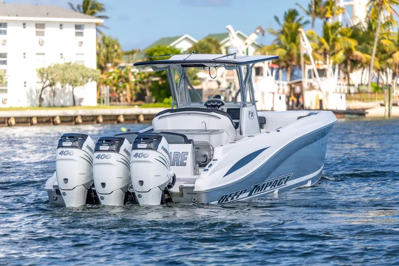 Slide: The Image of 2019 Deep Impact 369 Sport boat with triple 400 horsepower engines on water. - 8
