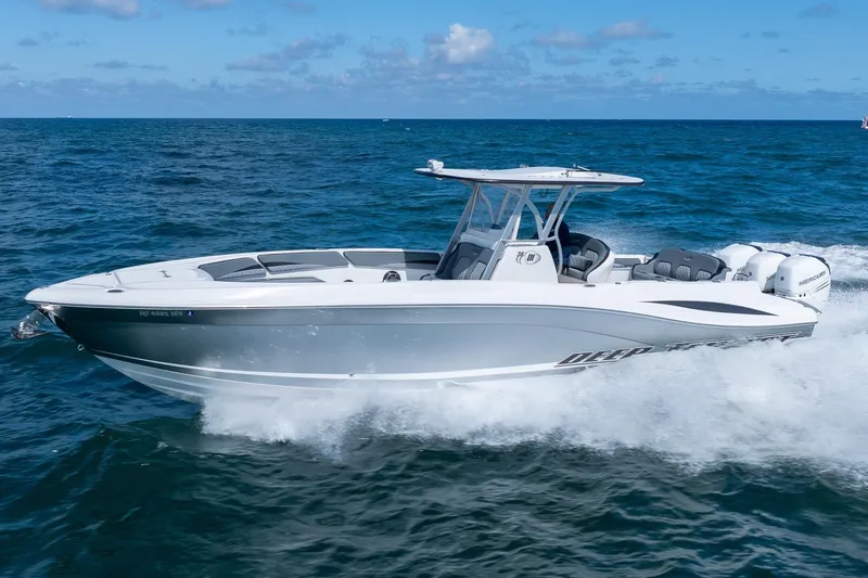 Slide: The Image of 2019 Deep Impact 369 Sport boat cruising on open ocean waters. - 9