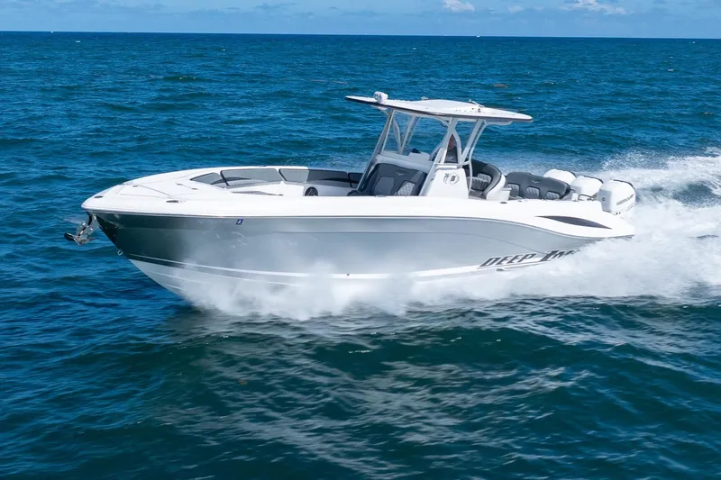 Slide: The Image of 2019 Deep Impact 369 Sport boat cruising on open ocean waters. - 94