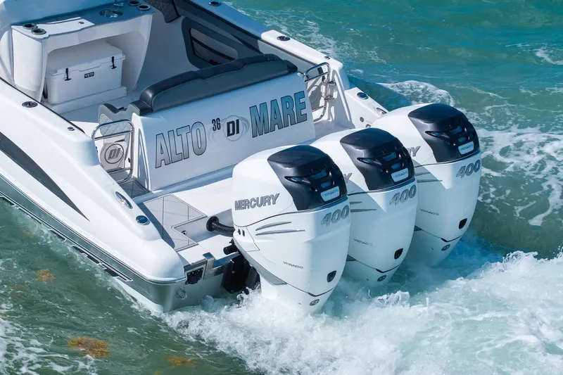 Slide: The Image of 2019 Deep Impact 369 Sport boat with triple Mercury 400 engines on the water. - 98