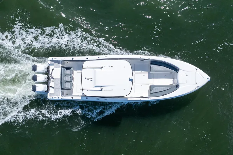 Slide: The Image of Aerial view of 2019 Deep Impact 369 Sport boat cruising on water. - 99