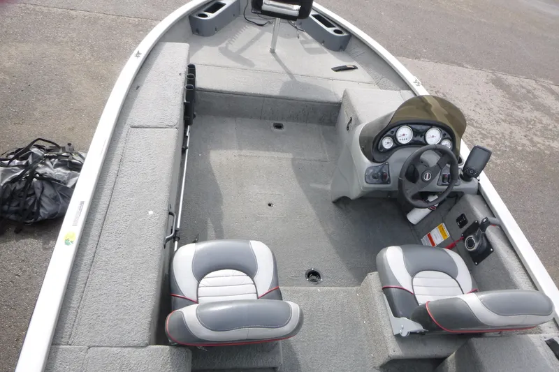 Slide: The Image of 2005 Tracker Tournament V-18 All Fish boat interior with steering console and seating. - 5