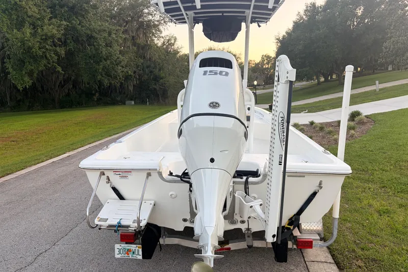 Slide: The Image of 2022 Clearwater 2100 Baystar boat with 150 HP engine on a trailer. - 5