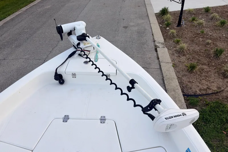 Slide: The Image of 2022 Clearwater 2100 Baystar boat with Minn Kota trolling motor on deck. - 7