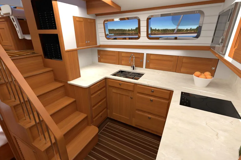 Slide: The Image of Luxurious kitchen interior of 2027 Hunt Yachts 56 Ocean Express, featuring wood cabinetry and modern appliances. - 12