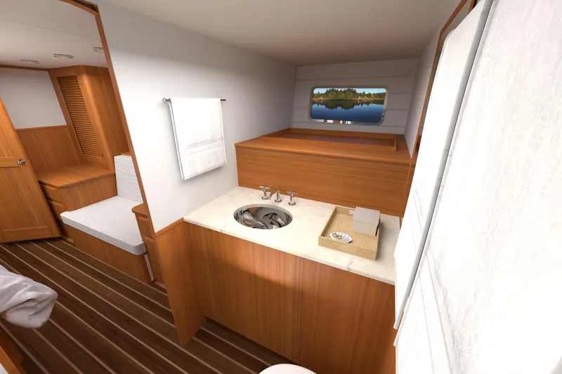 Slide: The Image of Luxurious bathroom interior of 2027 Hunt Yachts 56 Ocean Express with wooden accents. - 15