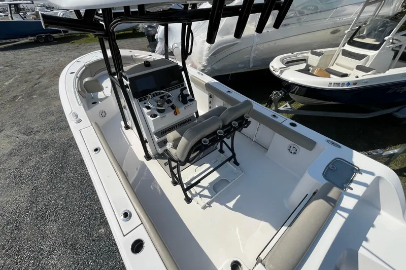 Slide: The Image of 2022 Sportsman Open 242 Center Console boat with spacious deck and modern controls. - 7