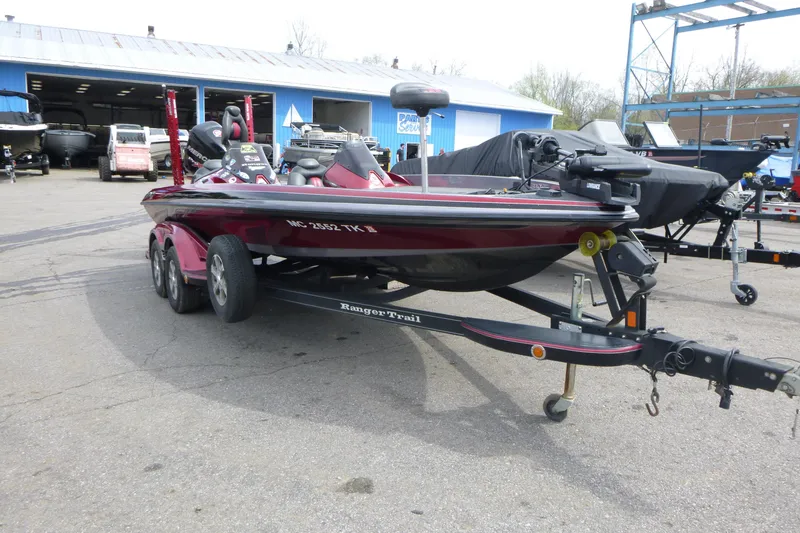 Slide: The Image of 2010 Ranger Z521 boat on trailer in outdoor storage area. - 3