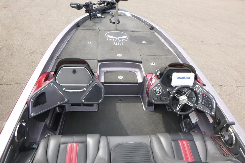 Slide: The Image of 2010 Ranger Z521 boat interior with steering console and Lowrance electronics. - 6