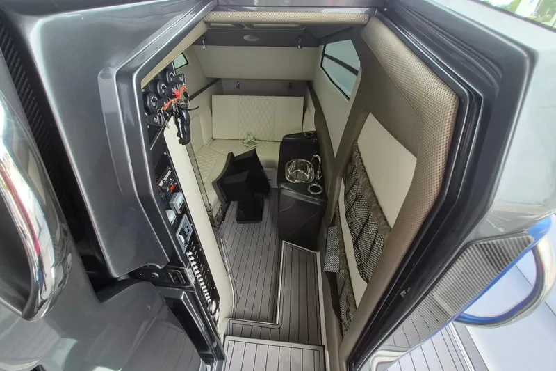 Slide: The Image of Interior cabin of 2020 Nor-Tech 450 Sport Center Console boat, featuring modern design and amenities. - 14