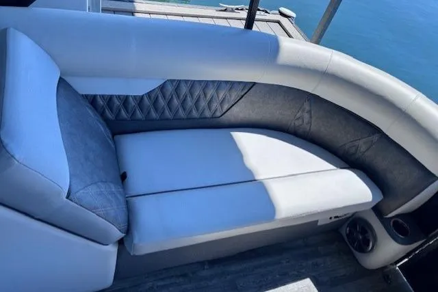 Slide: The Image of 2019 Crest 220 CREST III boat interior with cushioned seating and elegant design. - 11