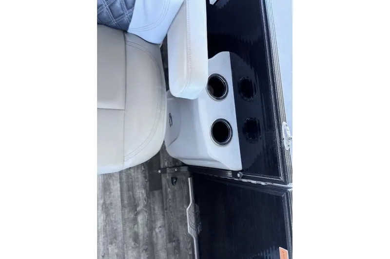 Slide: The Image of 2019 Crest 220 CREST III boat interior with cup holders and seating. - 16