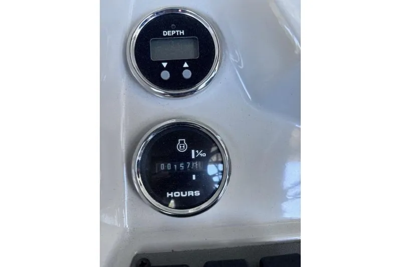 Slide: The Image of Close-up of 2019 Crest 220 CREST III boat gauges displaying depth and engine hours. - 3