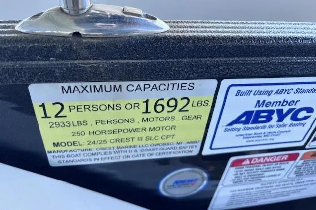 Slide: The Image of 2019 Crest 220 CREST III capacity label showing limits for persons and weight. - 5