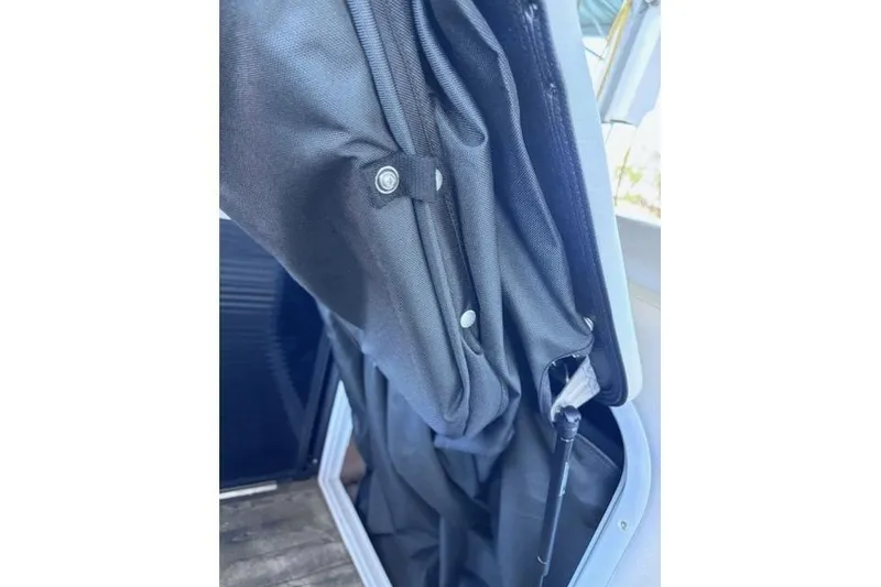 Slide: The Image of Close-up of 2019 Crest 220 CREST III boat canopy and hardware. - 6