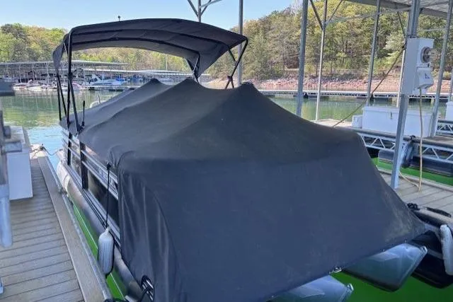 Slide: The Image of Covered 2019 Crest 220 CREST III pontoon boat docked at a marina. - 7