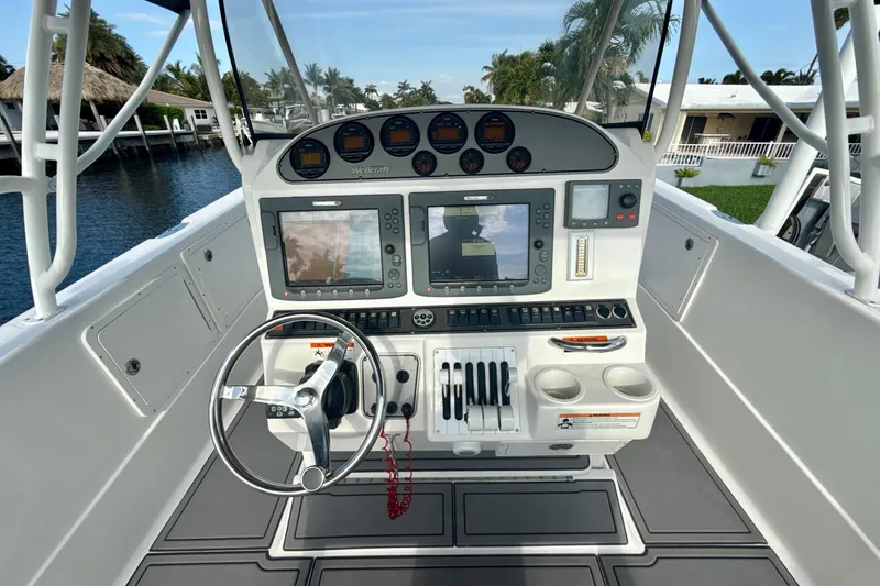 Slide: The Image of Cockpit view of 2006 Wellcraft 352 Sport boat with advanced navigation controls. - 12