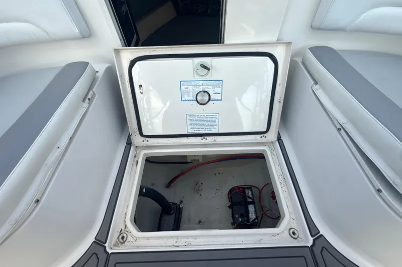 Slide: The Image of Open hatch on 2006 Wellcraft 352 Sport boat showing battery compartment. - 19