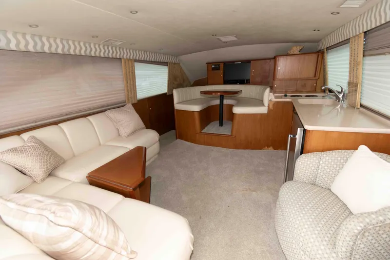 Slide: The Image of Luxurious interior of 2001 Ocean Yachts 40 Super Sport with plush seating and modern amenities. - 11