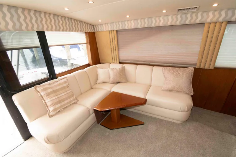 Slide: The Image of Luxurious interior of 2001 Ocean Yachts 40 Super Sport with plush seating and elegant decor. - 12