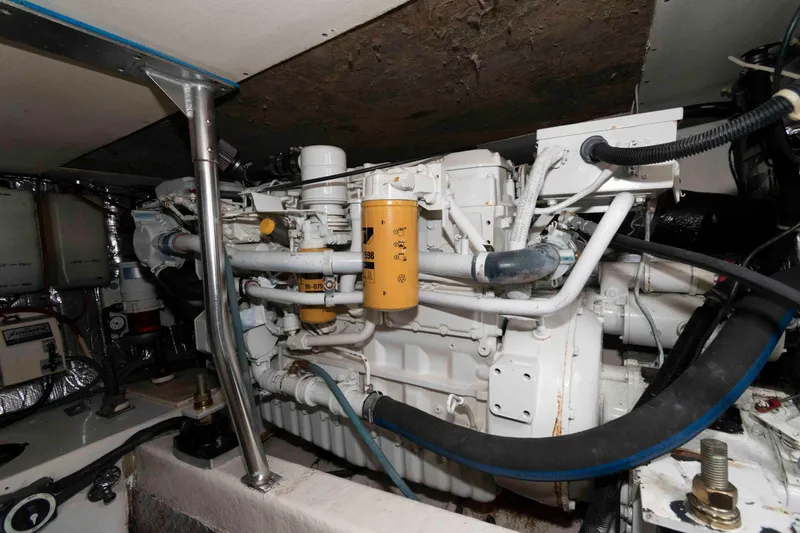 Slide: The Image of Engine room of a 2001 Ocean Yachts 40 Super Sport, showcasing mechanical components. - 20