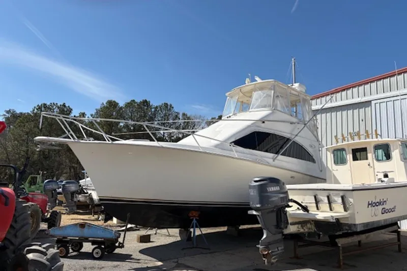 Slide: The Image of 2001 Ocean Yachts 40 Super Sport fishing deck with ladder and seating. - 3