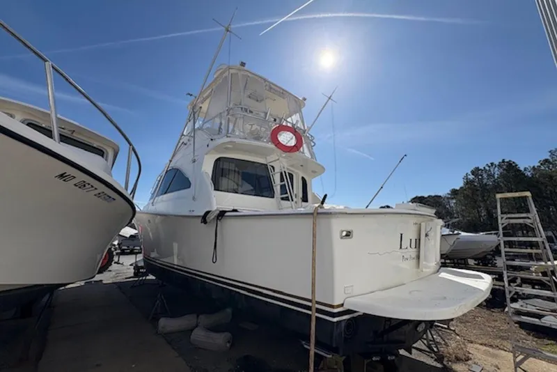 Slide: The Image of Helm of 2001 Ocean Yachts 40 Super Sport with steering wheel and controls. - 5